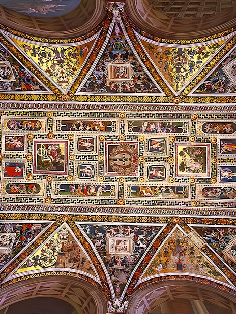Ceiling frescoes of Siena Cathedral, Italy, showcasing intricate religious artwork.