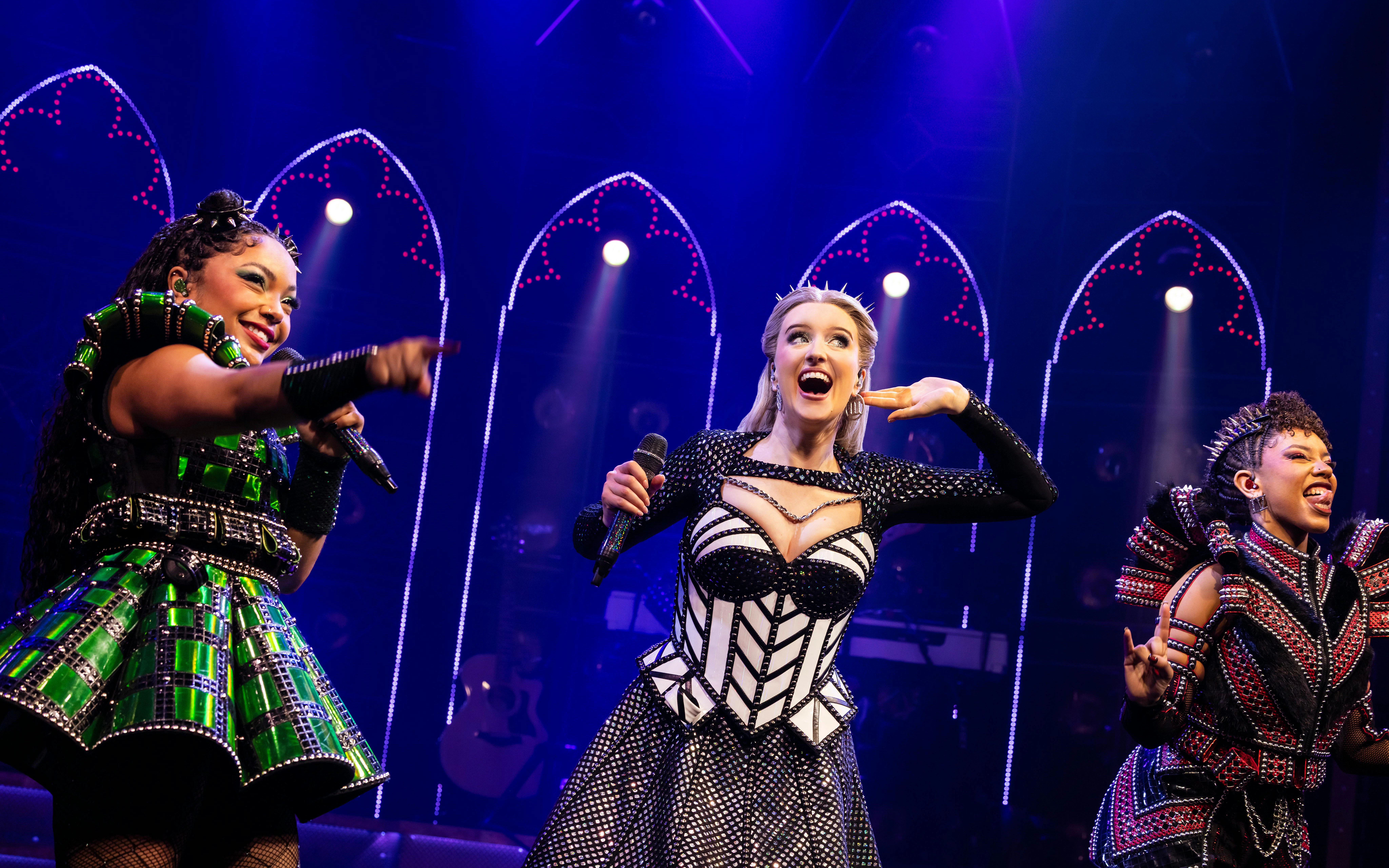 Performers on stage during Six musical in West End, London.