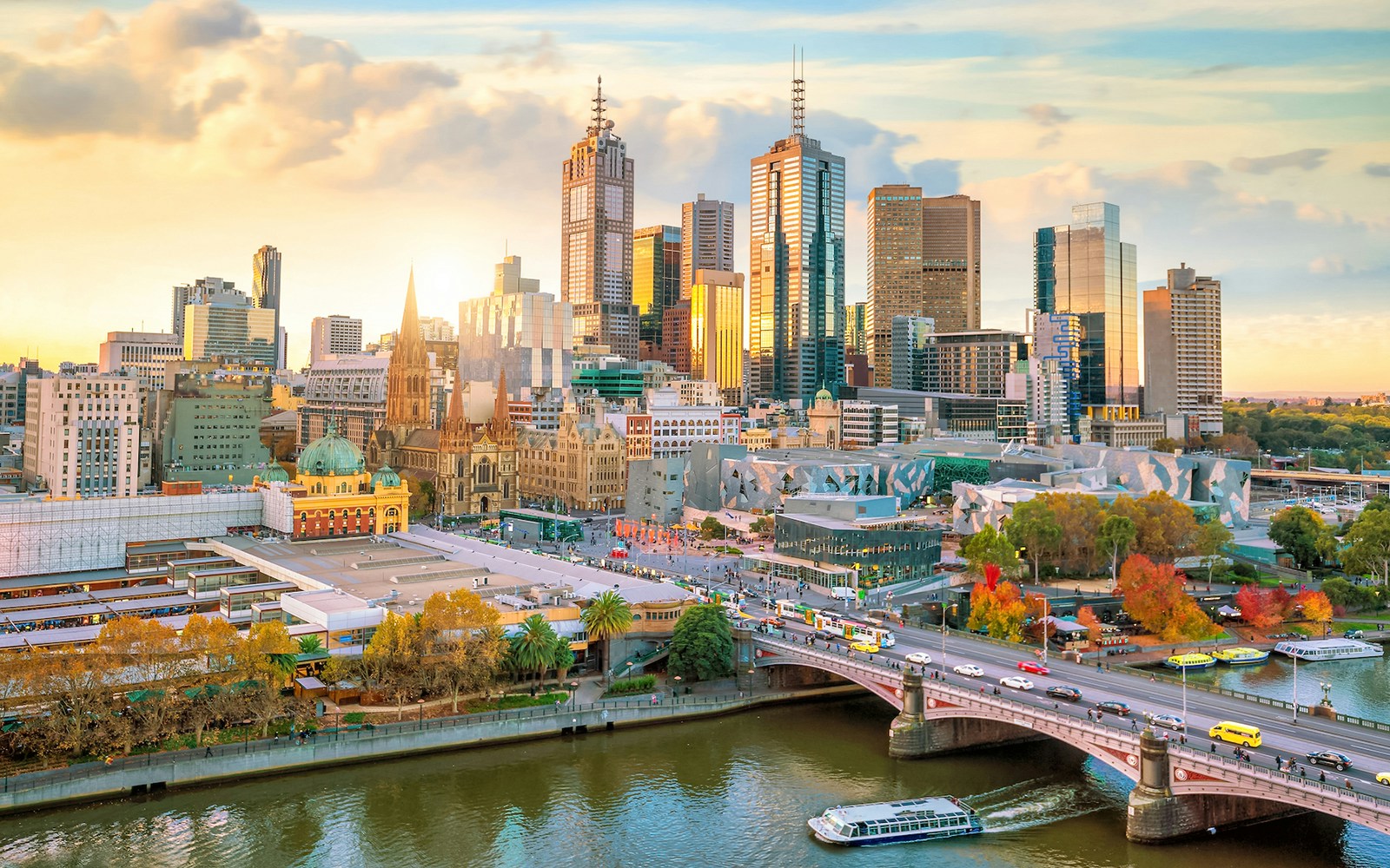 Melbourne skyline view from a floating brunch experience on the Yarra River.