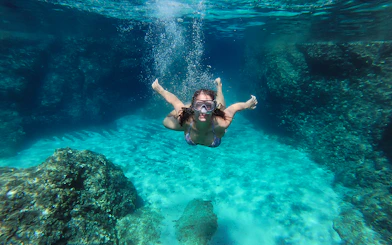 Snorkeler exploring underwater near Blue Cave, Dubrovnik.