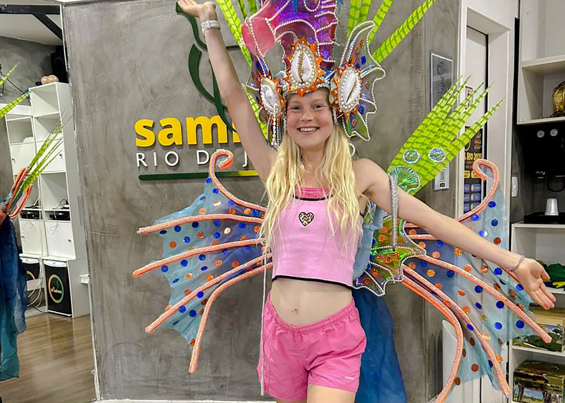 Participant in colorful costume at Samba class, Rio de Janeiro.