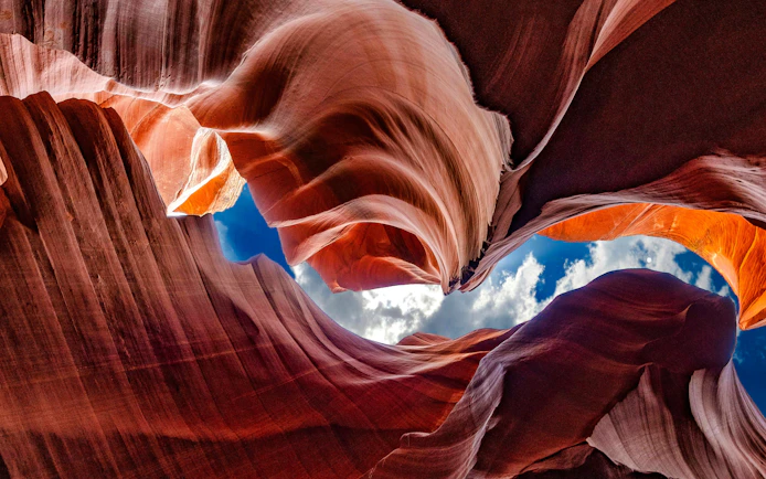 Antelope Canyon rock formations with sky view on small group tour.