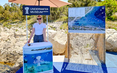 Underwater Museum Croatia information booth near Blue Lagoon.