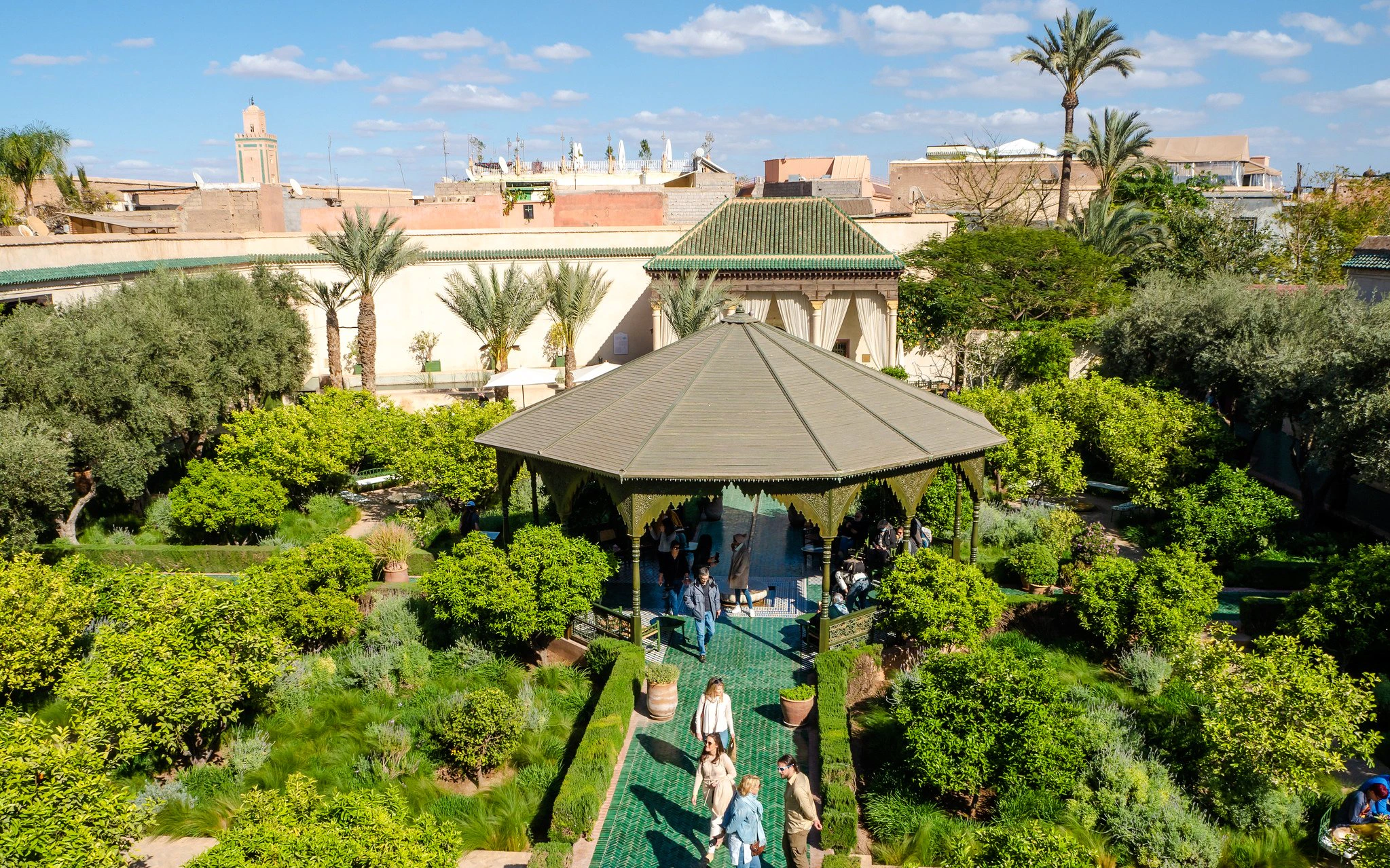 Le Jardin Secret garden with pavilion and visitors, Marrakech.