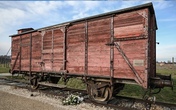 Wooden train car at Auschwitz-Birkenau, part of the 2-Day Guided Tour of Auschwitz & Wieliczka Salt Mine.
