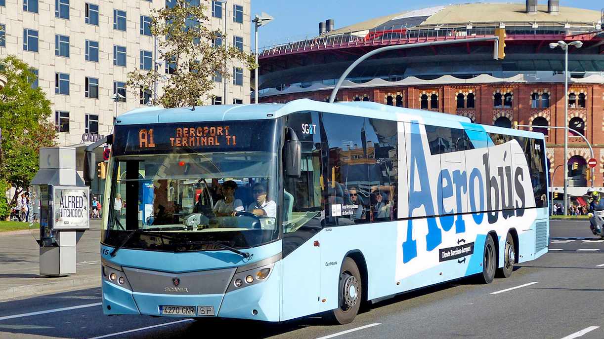 Aerobus at Barcelona Airport terminal for one-way transfer to city center.