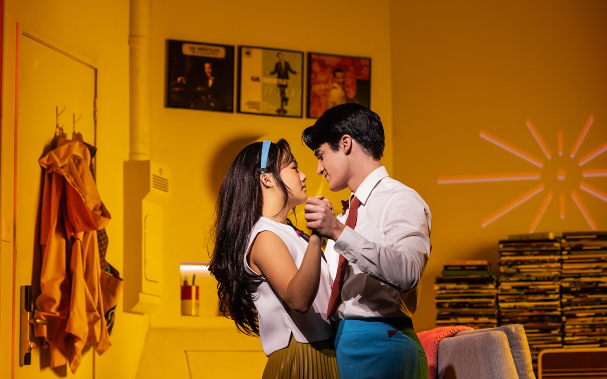 Couple dancing in a cozy room with records on the wall, Maybe Happy Ending musical.