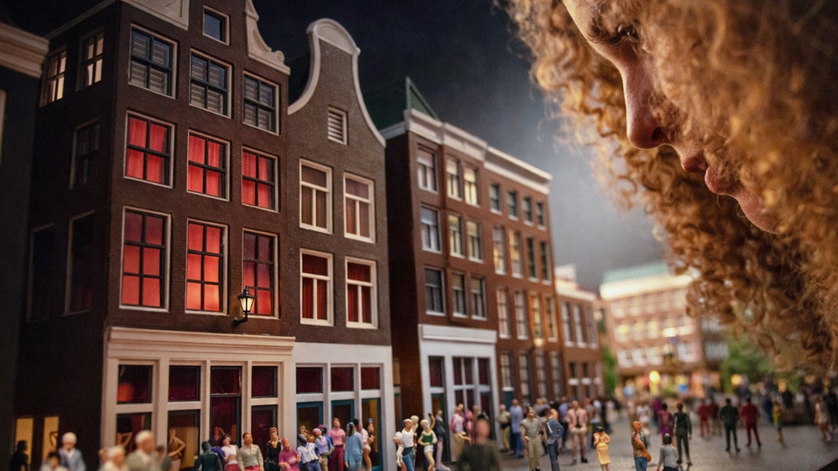 Miniature Amsterdam street scene with buildings and tiny figures at Miniature Museum.
