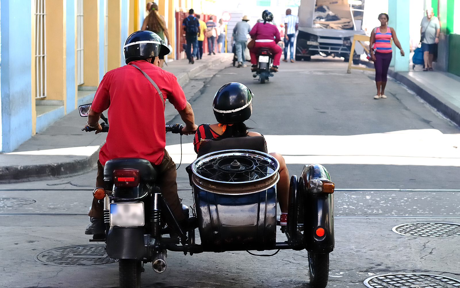 Vintage sidecar parked near Notre Dame Cathedral in Paris.