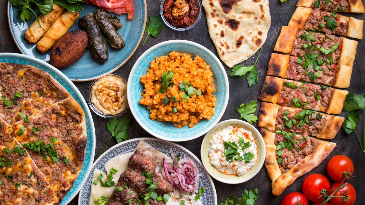 Turkish cuisine spread with kebabs, pide, and meze near Hagia Sophia, Istanbul.
