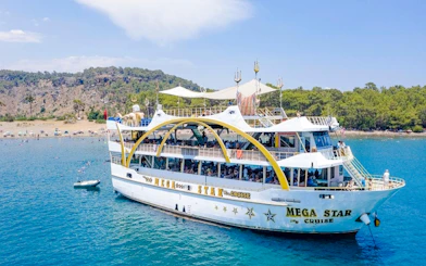 Mega Star Antalya-Kemer Boat Cruise with Lunch and DJ