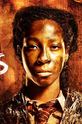 Lord of the Flies poster with character in front of fiery background