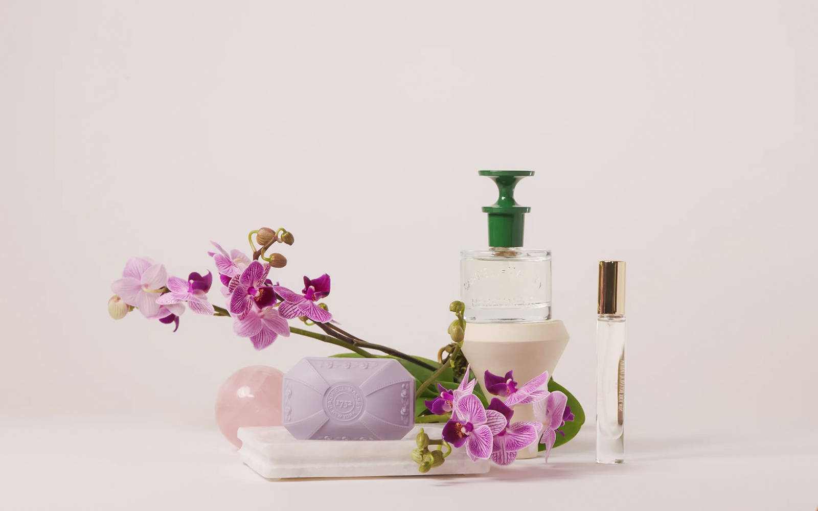 Perfume bottles and soap with orchids at NYBG shop.