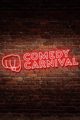 Neon sign reading "Comedy Carnival" on a brick wall, Covent Garden.