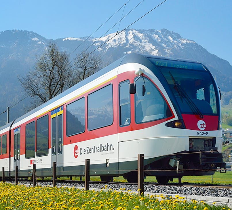 Train journey through snow-covered Swiss Alps from Lauterbrunnen to Jungfraujoch.