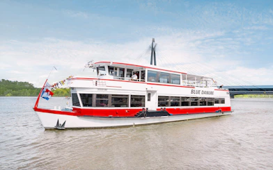 Sightseeing cruise boat on the Danube Canal in Vienna.