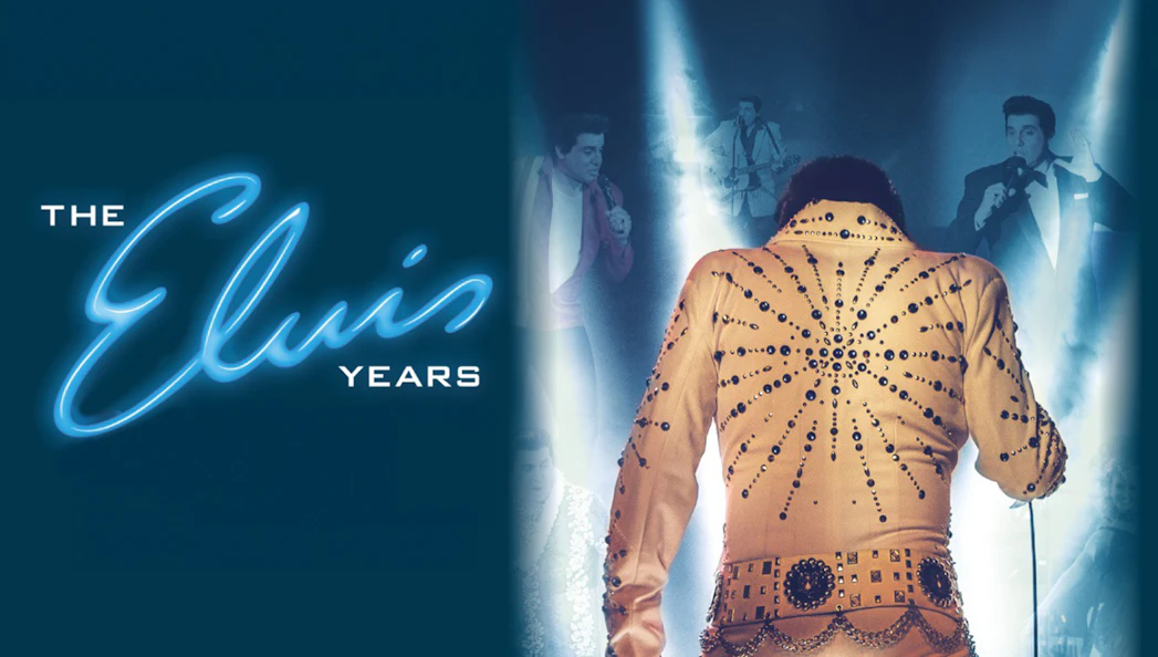 Performer in jeweled jumpsuit on stage, "The Elvis Years" show.