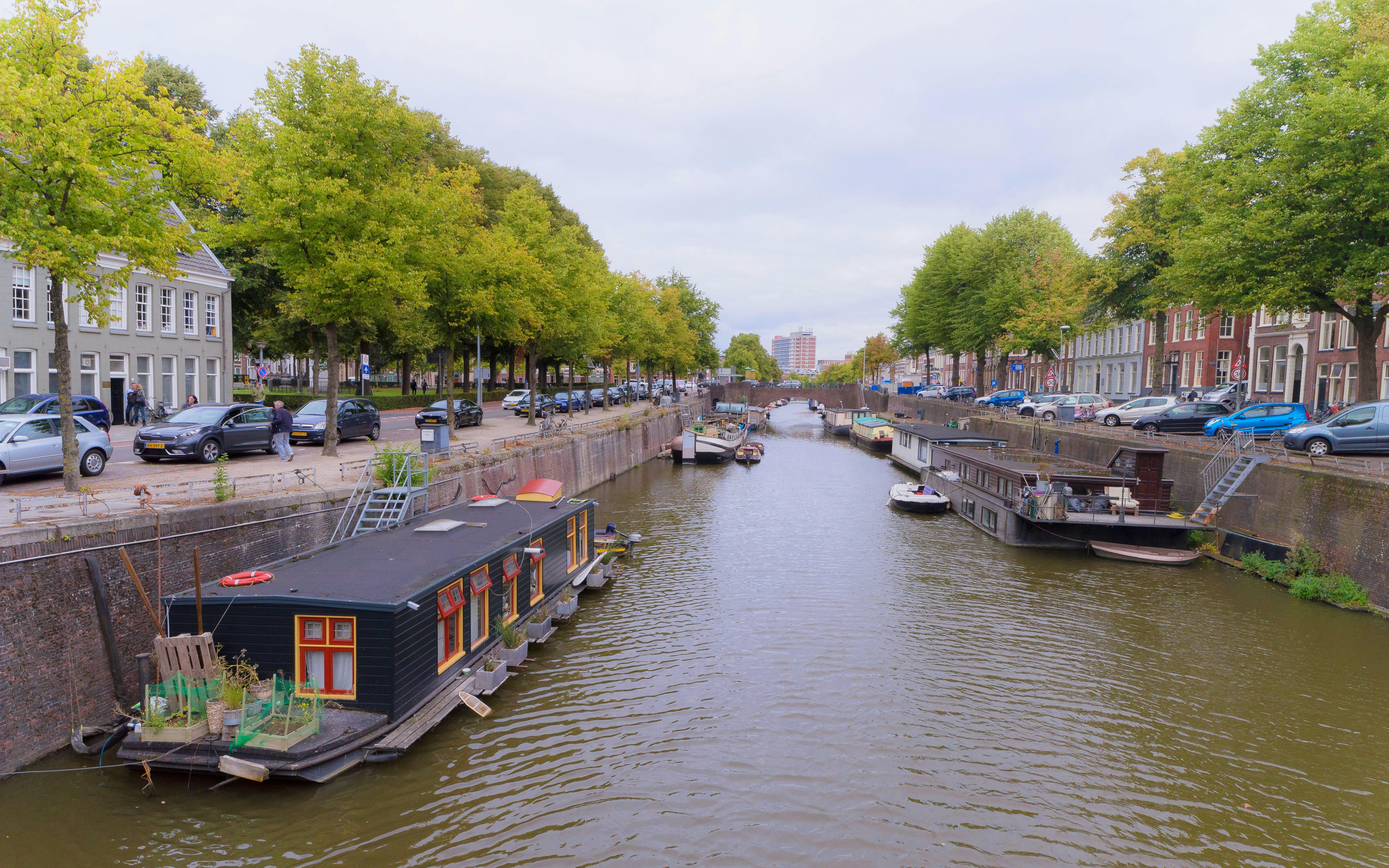 Houseboats along the Schuitendiep canal in Groningen, The Netherlands.
