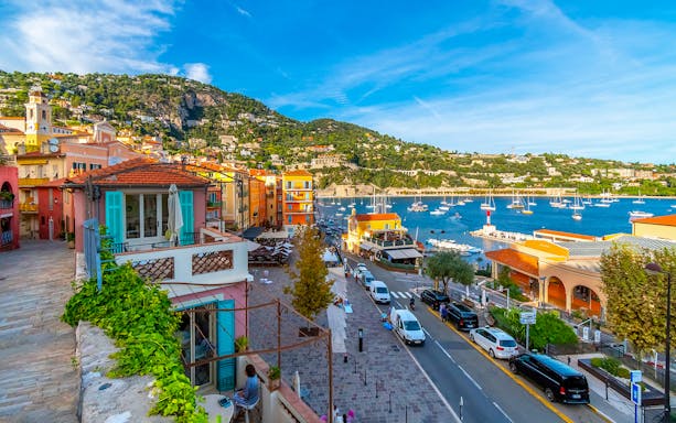 Colorful buildings and marina view on the Guided Electric Bike Tour of Nice, France.