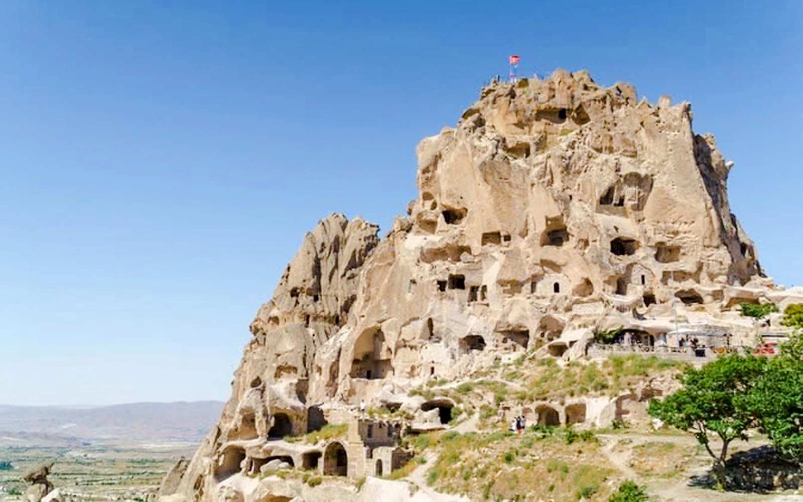 Rock formations and cave dwellings in Cappadocia, Turkey, part of the Red Tour.