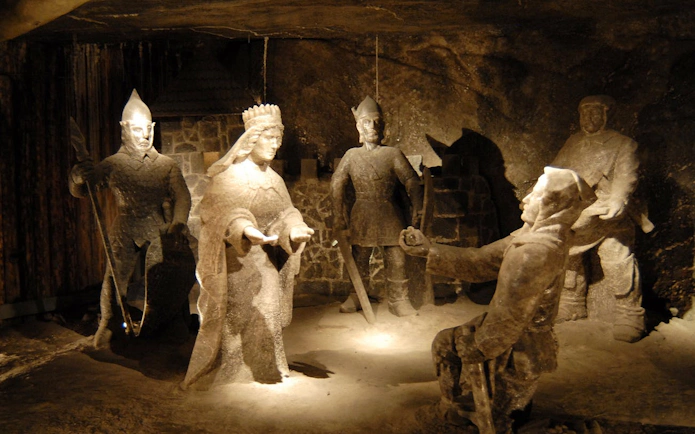 Salt sculptures depicting historical figures in Wieliczka Salt Mine, Poland.
