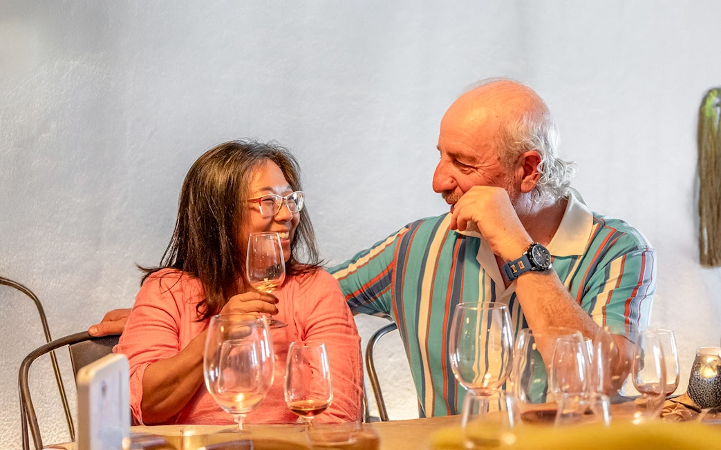Couple enjoying wine tasting on Douro Historical Tour from Porto.