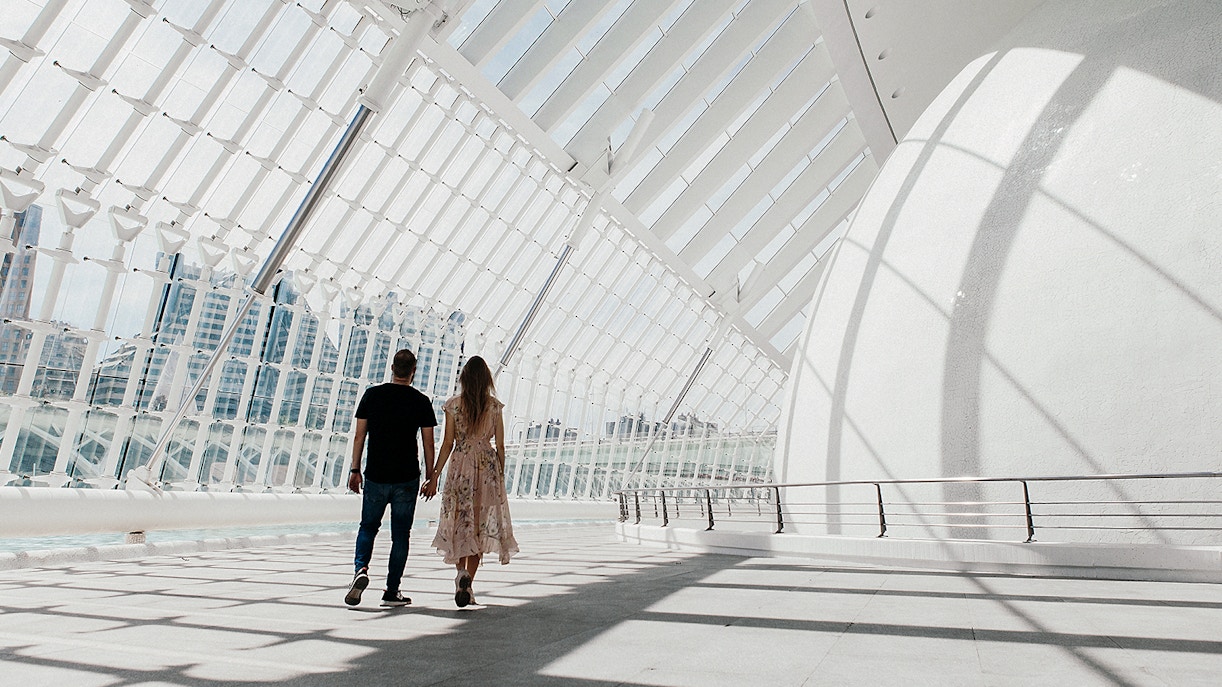 Hemisfèric building reflecting in water at Valencia's City of Arts and Sciences.