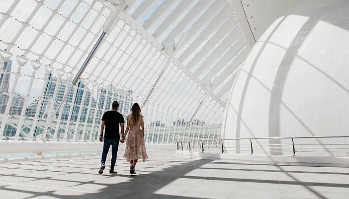 Hemisfèric building reflecting in water at Valencia's City of Arts and Sciences.