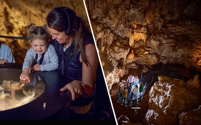 Mammoth Cave audio tour with child exploring exhibit and group in Ngilgi Cave, Margaret River.
