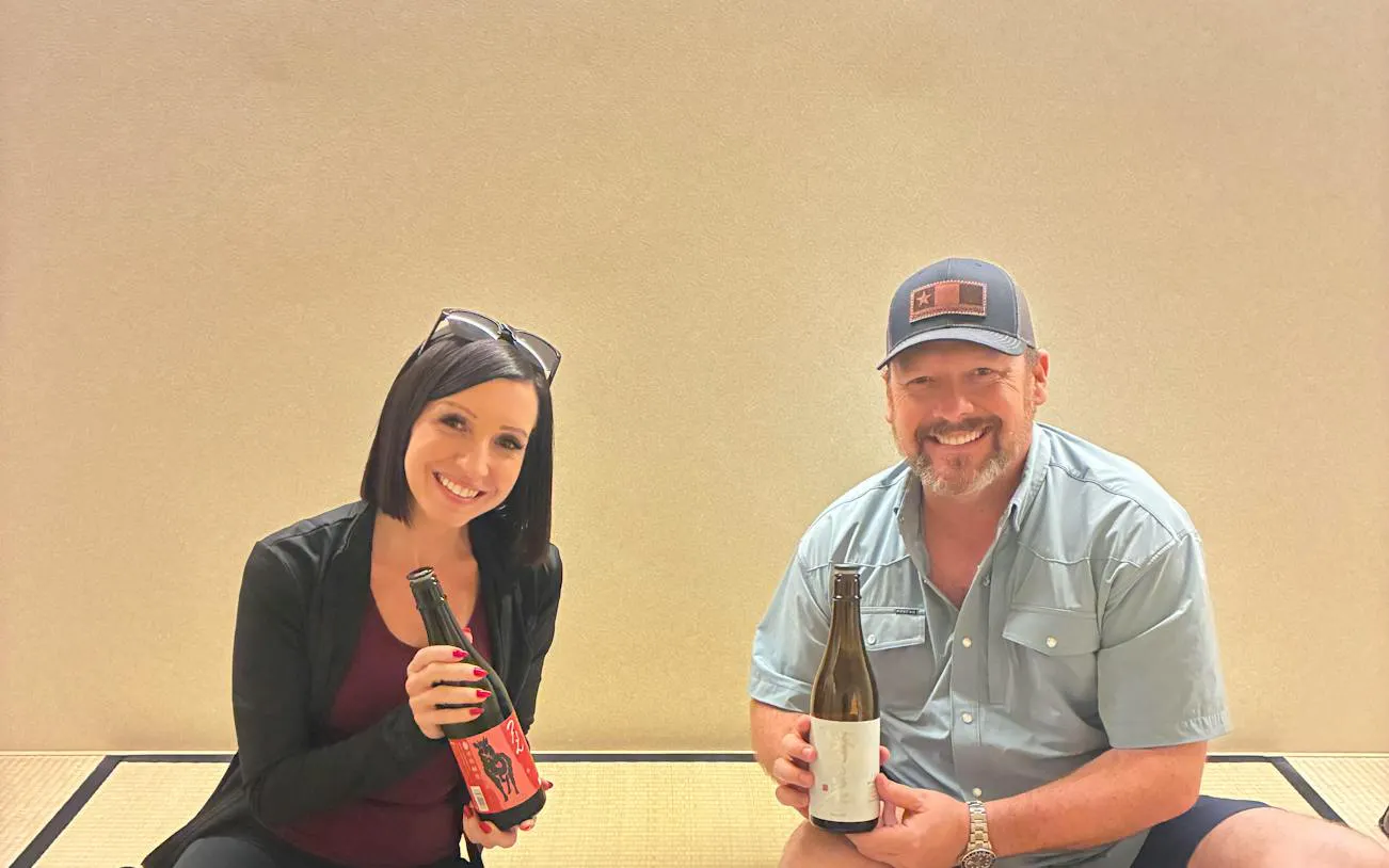 Couple enjoying sake tasting experience in Kyoto with a sake sommelier.