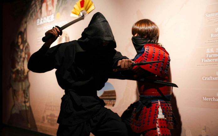 Samurai and ninja reenactment at Samurai Ninja Museum in Japan.