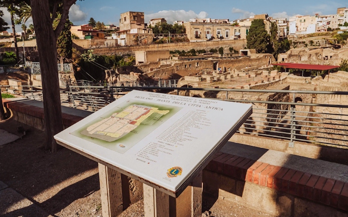Map display overlooking Herculaneum ruins in Italy.