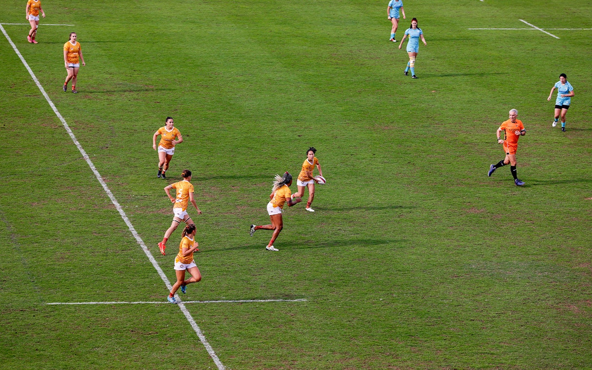 Rugby players in action during Emirates Dubai 7s match.