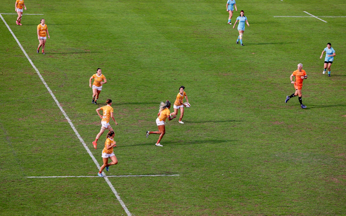 Rugby players in action during Emirates Dubai 7s match.