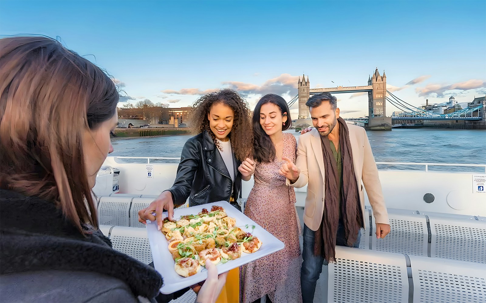 Guests enjoying Canapés on the Thames cruise