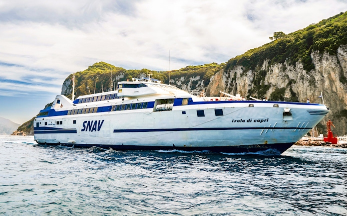 SNAV ferry sailing near Capri cliffs, route between Naples and Capri.