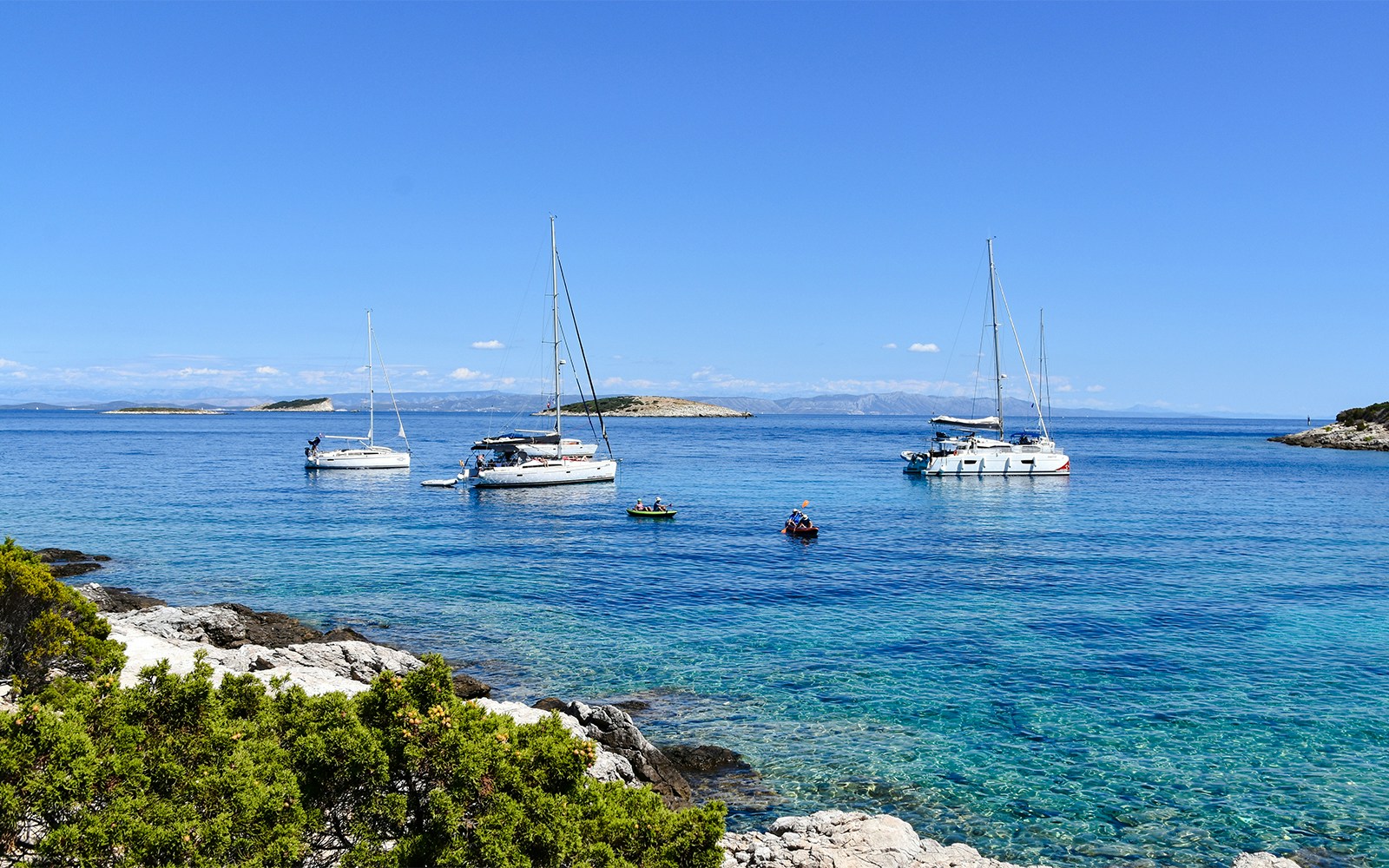 Sailboats anchored near Budikovac Island's Blue Lagoon, Croatia.