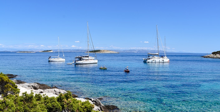 Sailboats anchored near Budikovac Island's Blue Lagoon, Croatia.