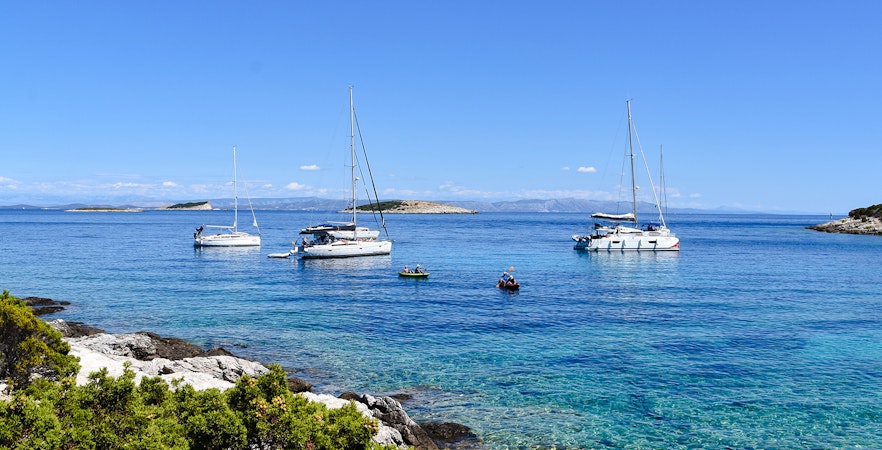 Sailboats anchored near Budikovac Island's Blue Lagoon, Croatia.