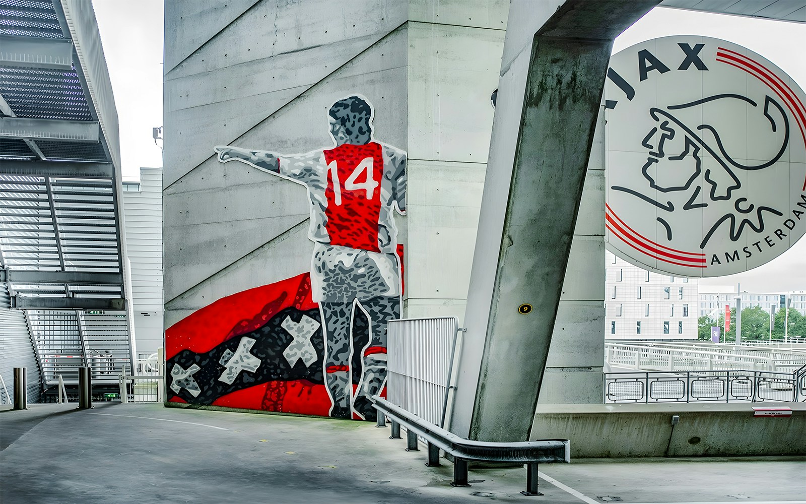 Mural of a football player with number 14 at Johan Cruijff ArenA, Amsterdam.