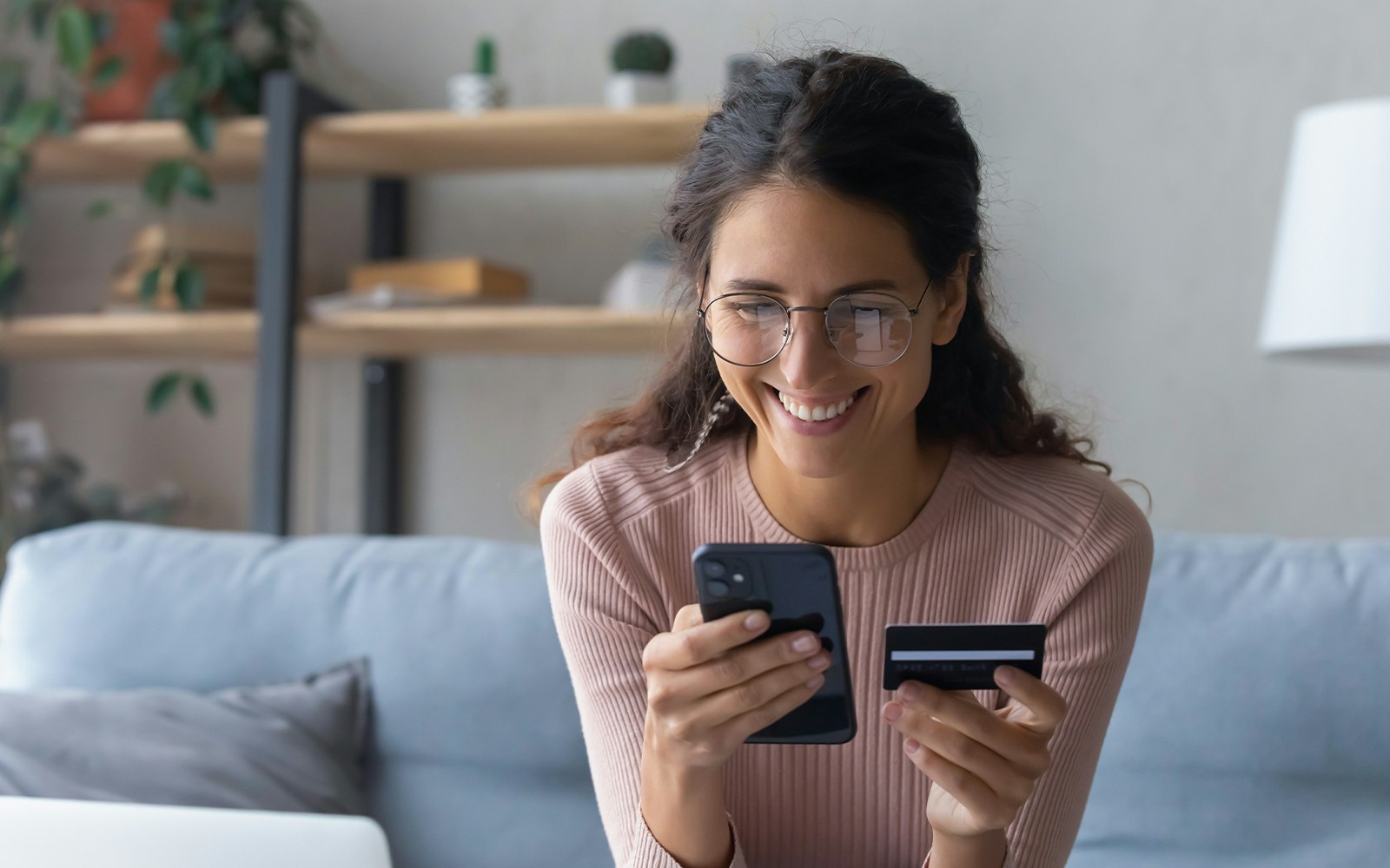 woman booking affordable tickets on her phone