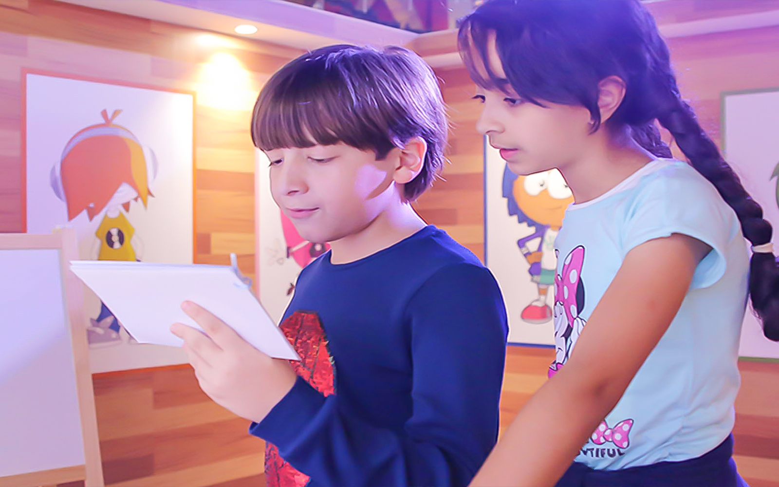 Children engaging in rising star role-play activities at KidZania Abu Dhabi indoor theme park.