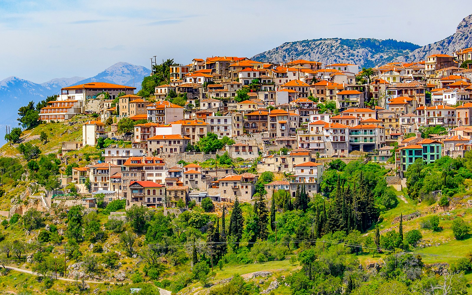 Arachova village with traditional houses on a hillside near Athens, Greece.