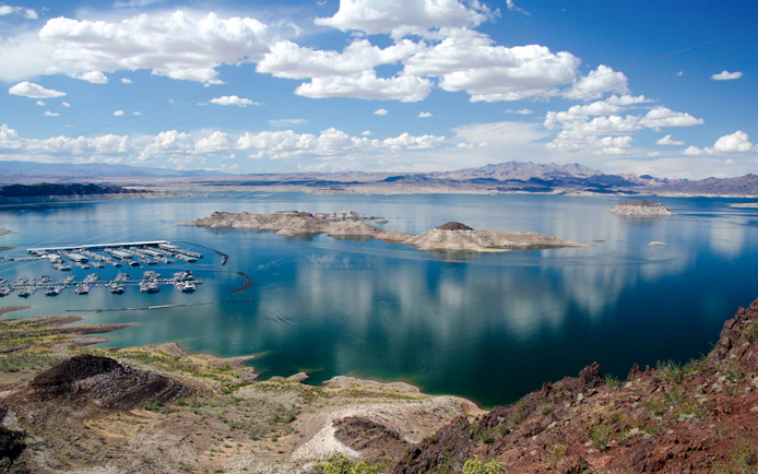 Lake Mead view with marina and distant mountains, seen during Grand Canyon West Rim tour from Las Vegas.