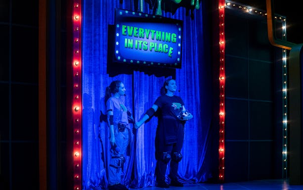 Performers on stage under "Everything in Its Place" sign during The Life and Slimes of Marc Summers show.