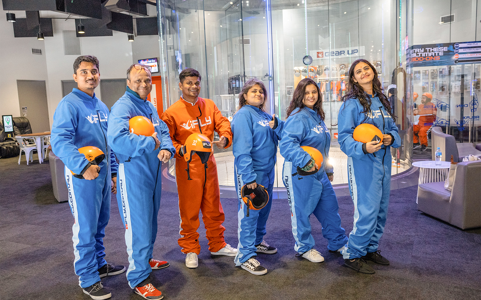 Group in flight suits at iFly Sydney Indoor Skydiving.