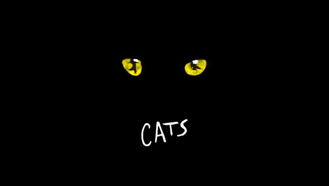 Yellow cat eyes and 'CATS' text, Sydney show promotion.