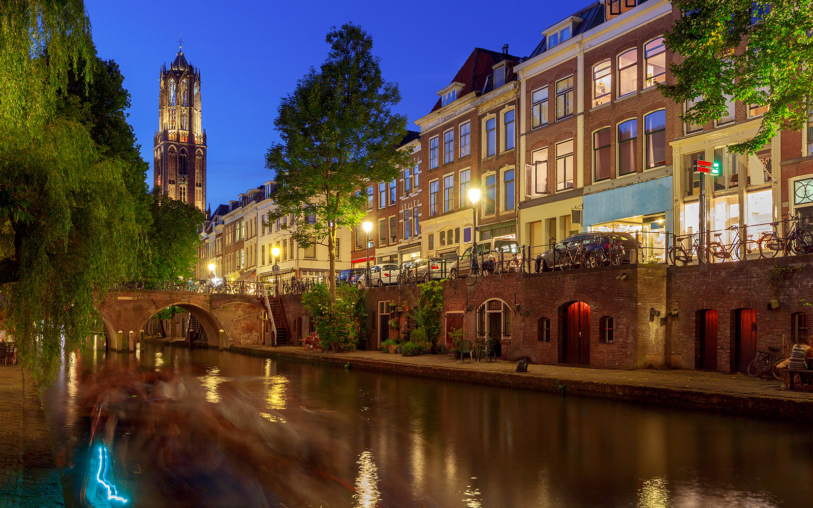 Utrecht canal with historic buildings and boats in the Netherlands.