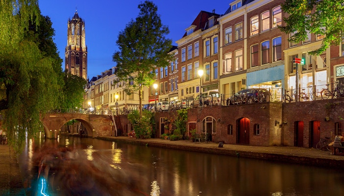 Utrecht canal with historic buildings and boats in the Netherlands.