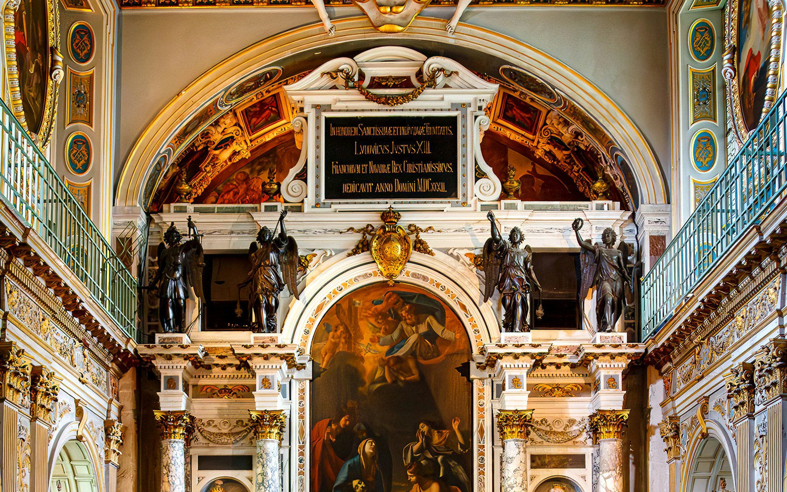 Chapel of the Trinity interior with ornate sculptures and paintings, Château de Fontainebleau.
